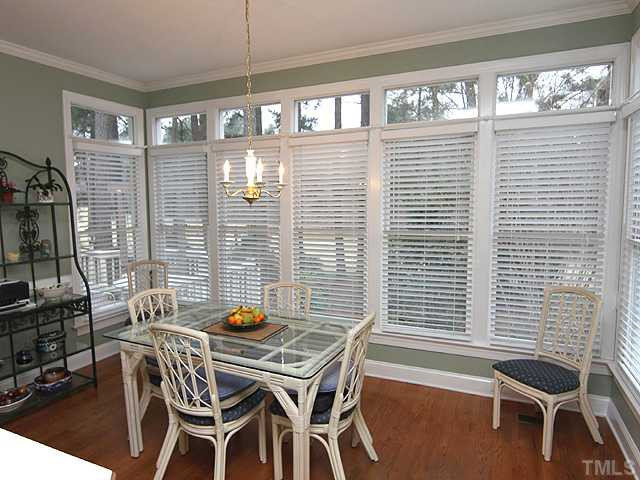 2964 Tillinghast Trail Raleigh, NC 27613 - Photo 4 of 23 Lovely casual eating area that is large enough to accomodate table to seat 8. Looks out onto deck and golf course. Breakfast Area