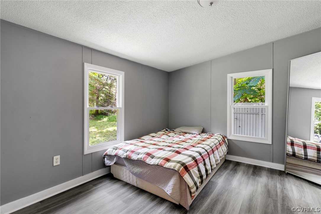 3549 Cedar Plains Road Sandy Hook, VA 23153 - Photo 13 of 26 a bedroom with a bed and a window
