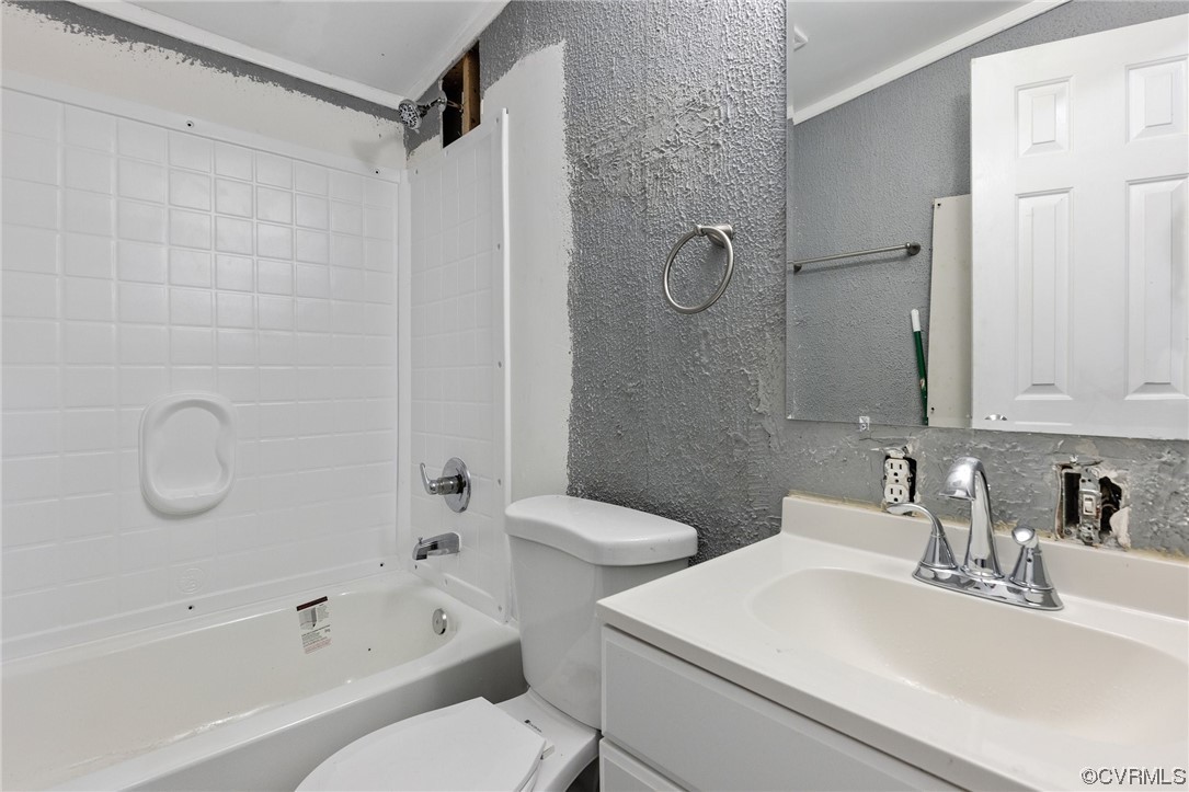 3549 Cedar Plains Road Sandy Hook, VA 23153 - Photo 15 of 26 a bathroom with a sink toilet and shower