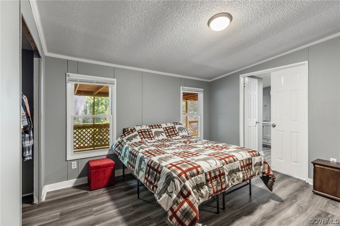 3549 Cedar Plains Road Sandy Hook, VA 23153 - Photo 17 of 26 a bedroom with a bed and a window