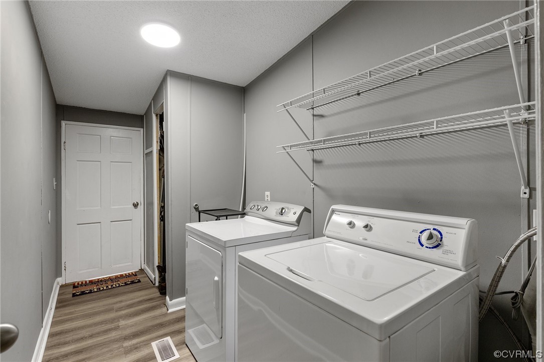 3549 Cedar Plains Road Sandy Hook, VA 23153 - Photo 21 of 26 a utility room with dryer and washer