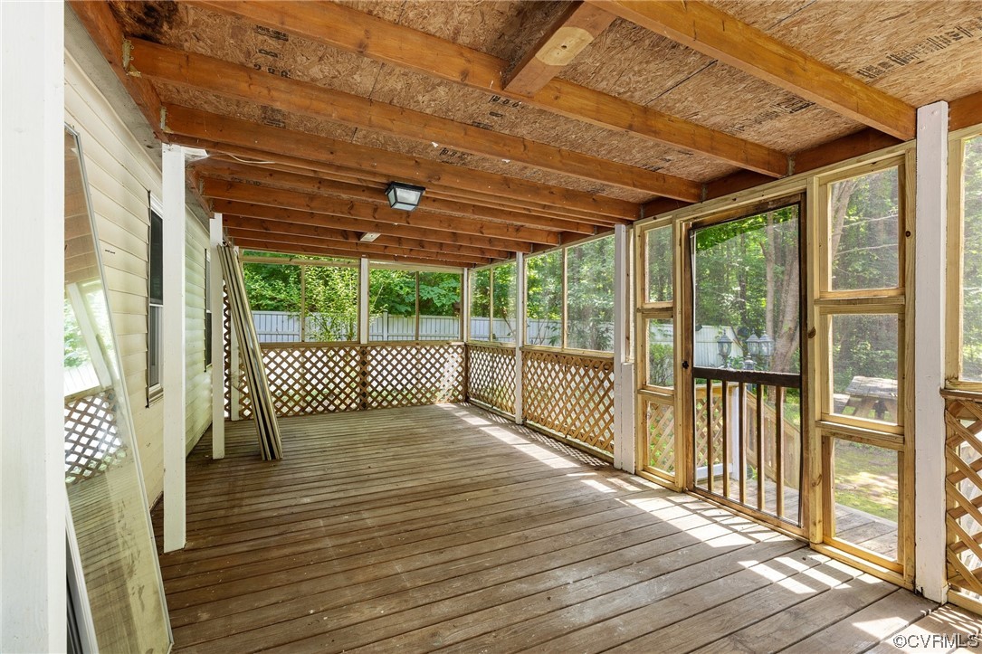 3549 Cedar Plains Road Sandy Hook, VA 23153 - Photo 22 of 26 a view of a room with wooden floor and iron stairs