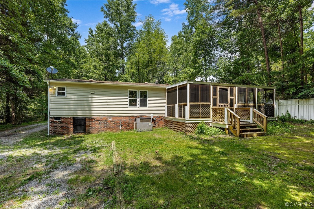 3549 Cedar Plains Road Sandy Hook, VA 23153 - Photo 24 of 26 a view of a house with backyard