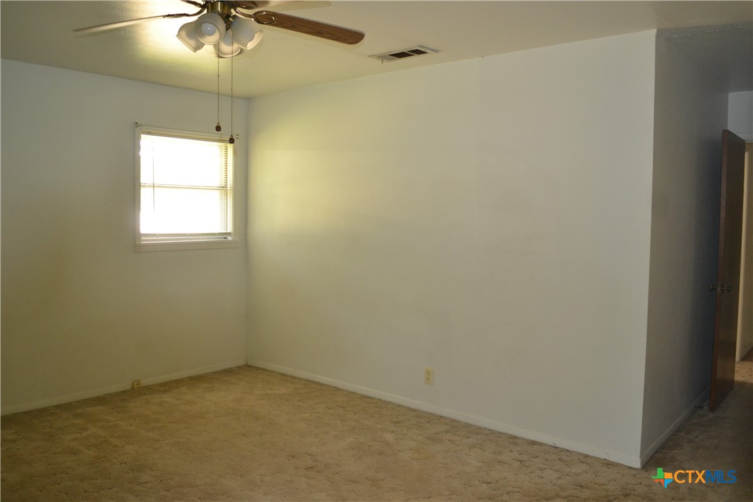 2202 South 53rd Street Temple, TX 76504 - Photo 19 of 27 an empty room with a window