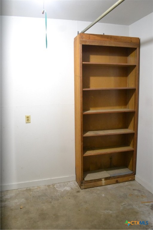 2202 South 53rd Street Temple, TX 76504 - Photo 24 of 27 a view of walk in closet with empty racks