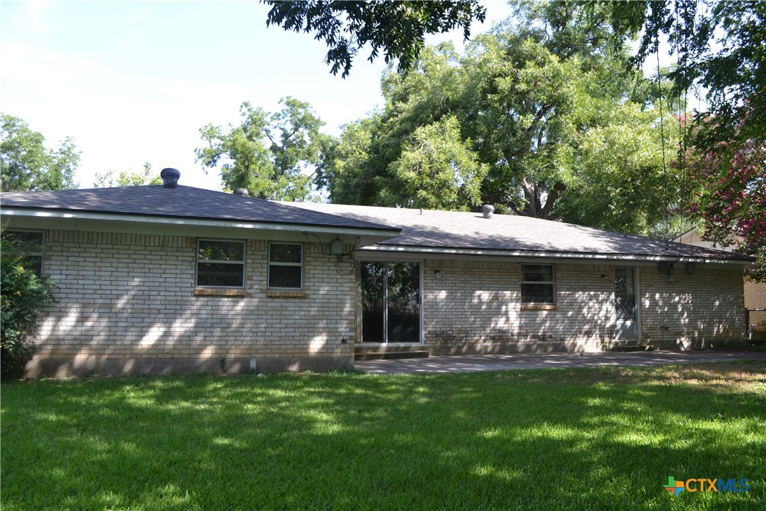 2202 South 53rd Street Temple, TX 76504 - Photo 27 of 27 a view of a wooden house with a yard