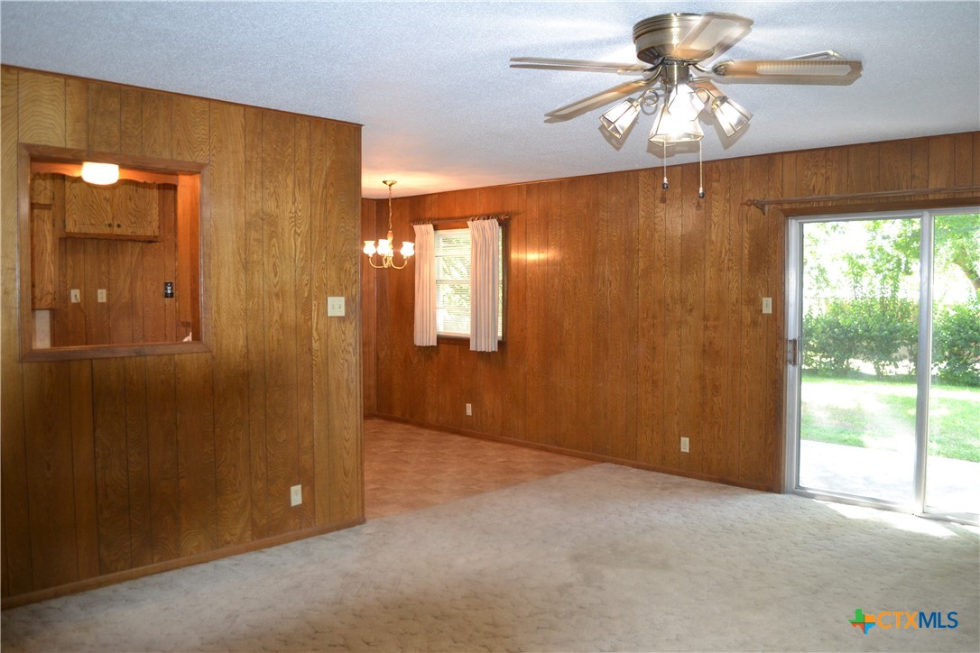 2202 South 53rd Street Temple, TX 76504 - Photo 6 of 27 wooden floor in an empty room with a window