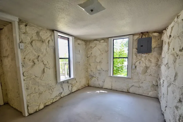 a view of balcony with wooden floor