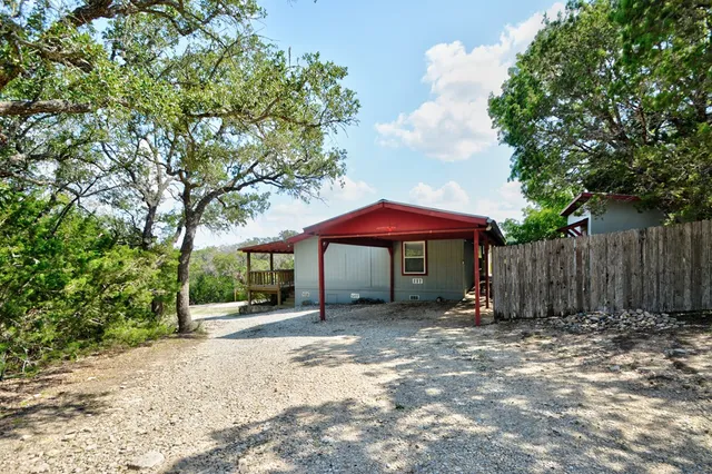 a view of porch with wooden floor