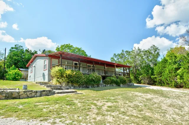 a house view with a swimming pool
