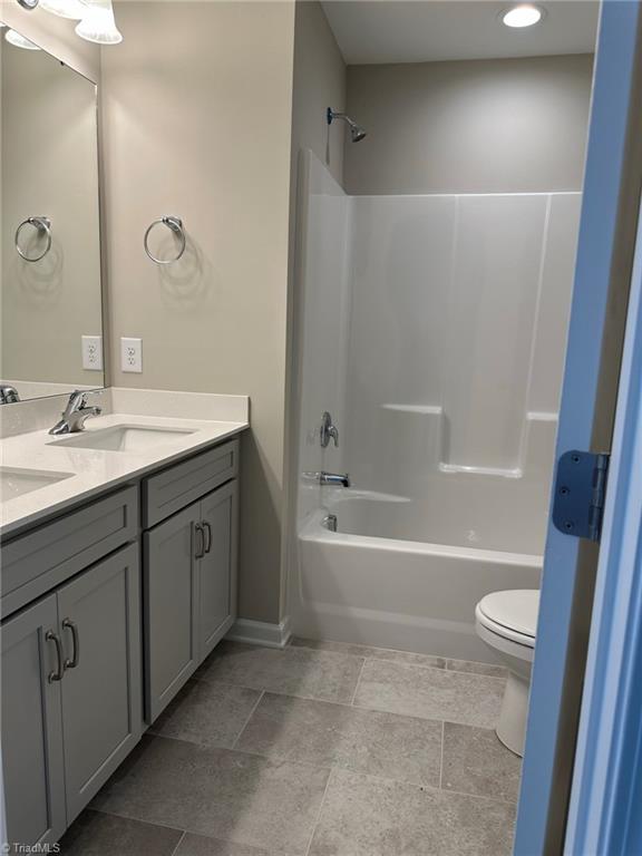 3224 Alyssa Way High Point, NC 27265 - Photo 15 of 27 Two sinks, tile floor, quartz