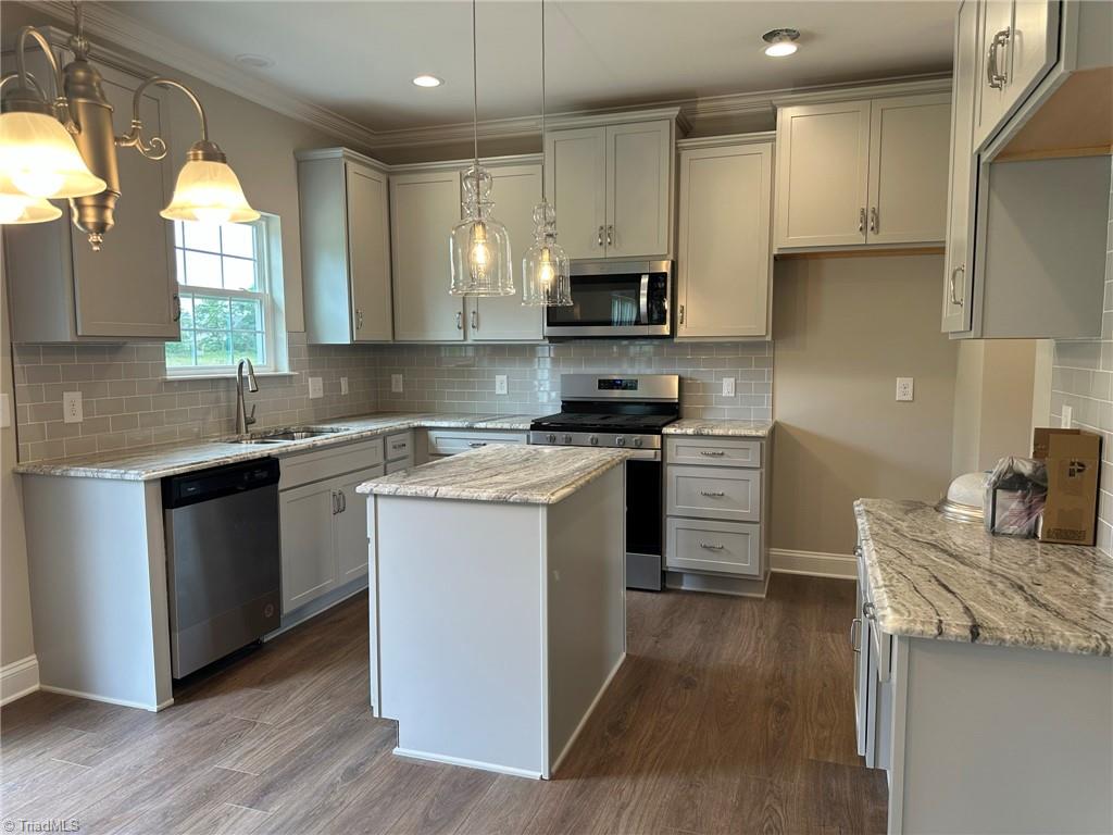 3224 Alyssa Way High Point, NC 27265 - Photo 5 of 27 Tile backsplash & gorgeous pendants
