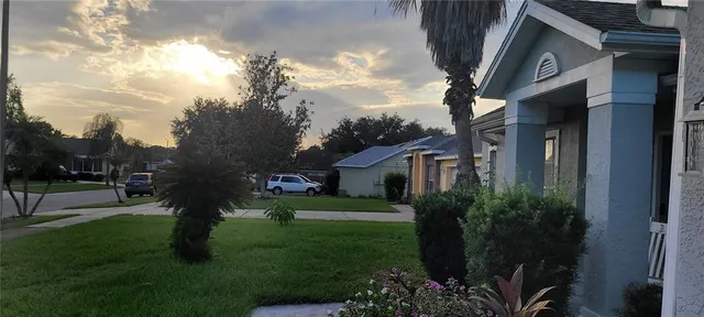 a view of a yard in front of house