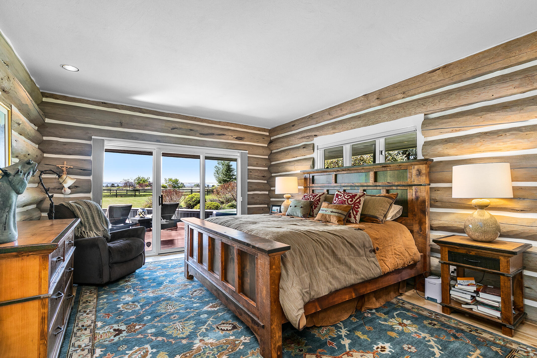 65105 Quail Farm Road Bend, OR 97703 - Photo 19 of 27 Master Bedroom on the Main Floor with direct access to hot tub.