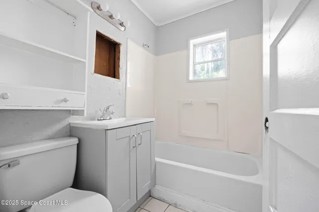 a bathroom with a sink toilet and bathtub