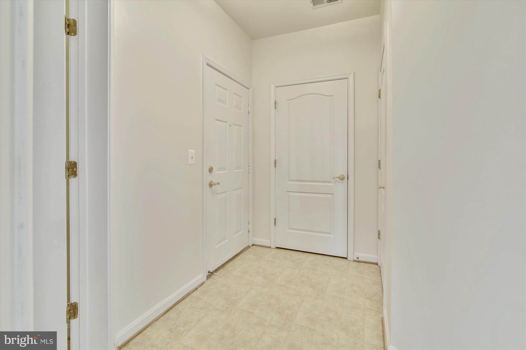 8601 Roaming Ridge Way, Unit 306 Odenton, MD 21113 - Photo 3 of 25 Foyer