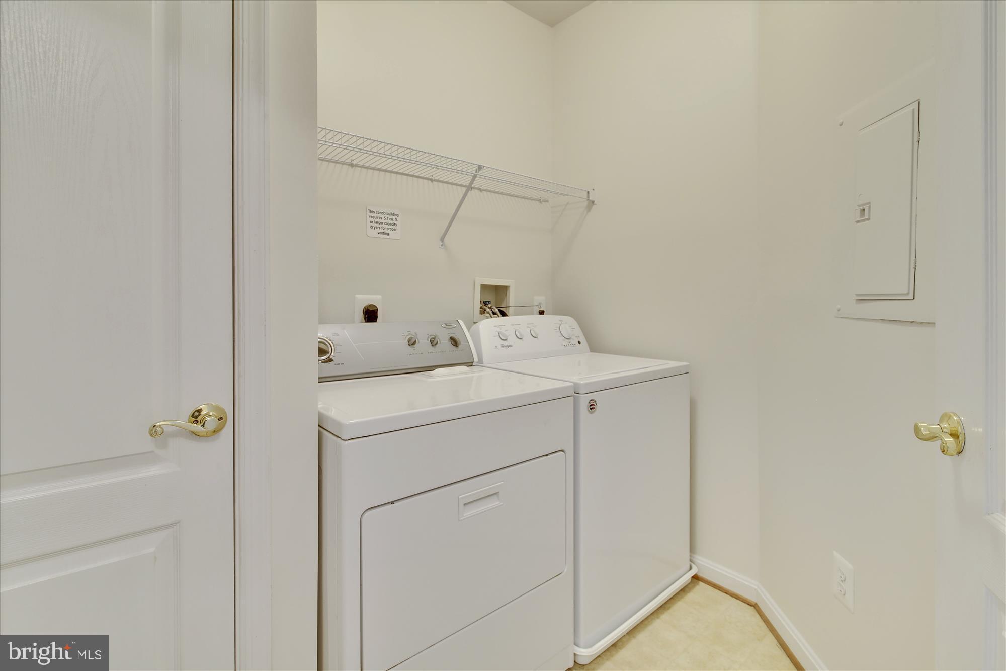 8601 Roaming Ridge Way, Unit 306 Odenton, MD 21113 - Photo 23 of 25 Laundry room