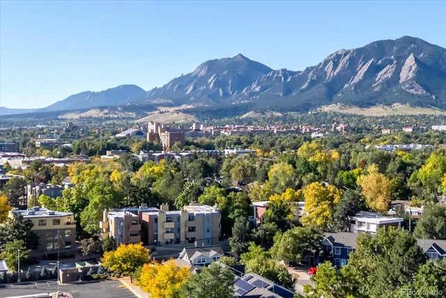 a view of a city with a mountain