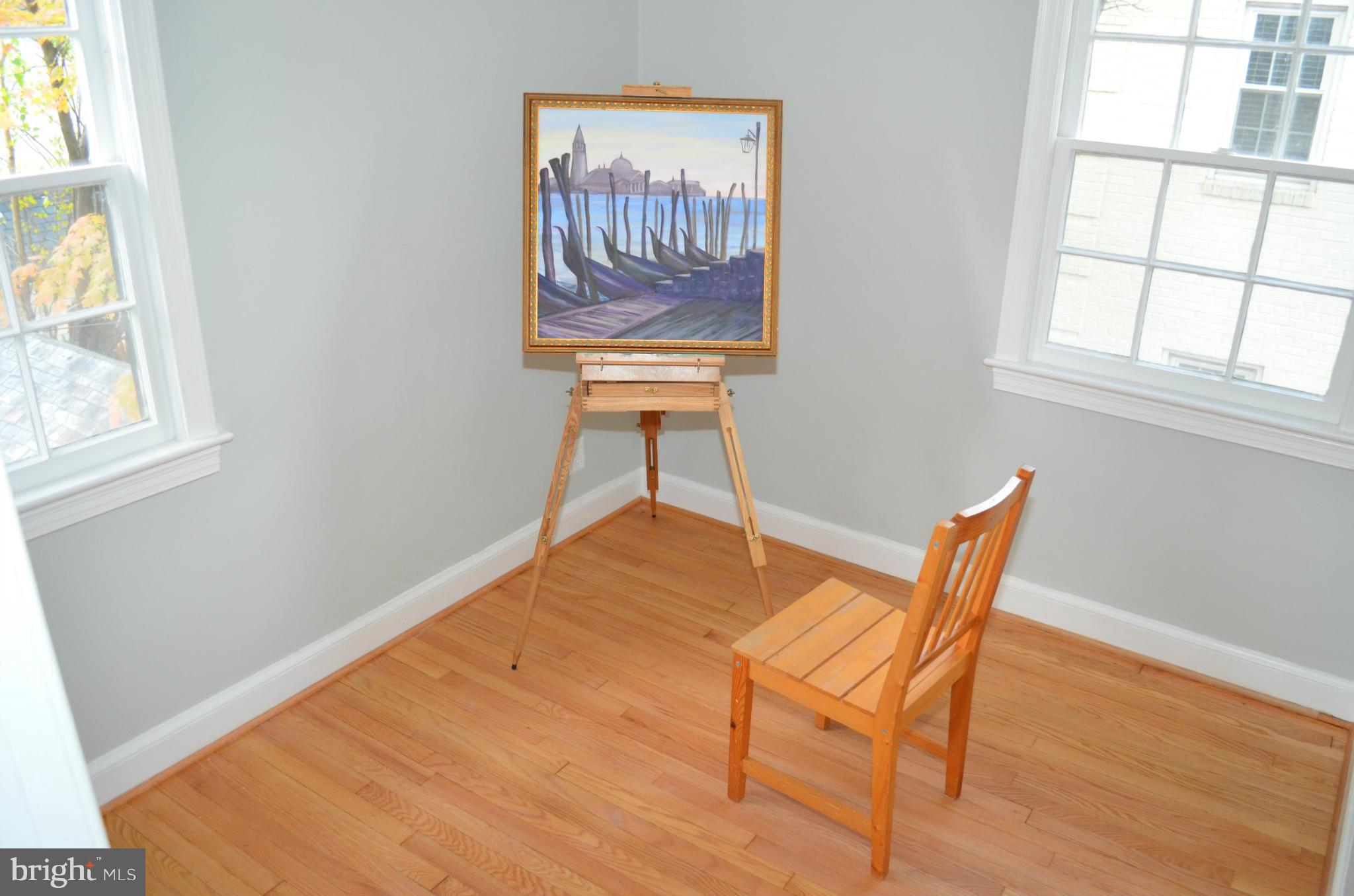 3134 38th Street Northwest Washington, DC 20016 - Photo 21 of 30 a view of a workspace with furniture and a window