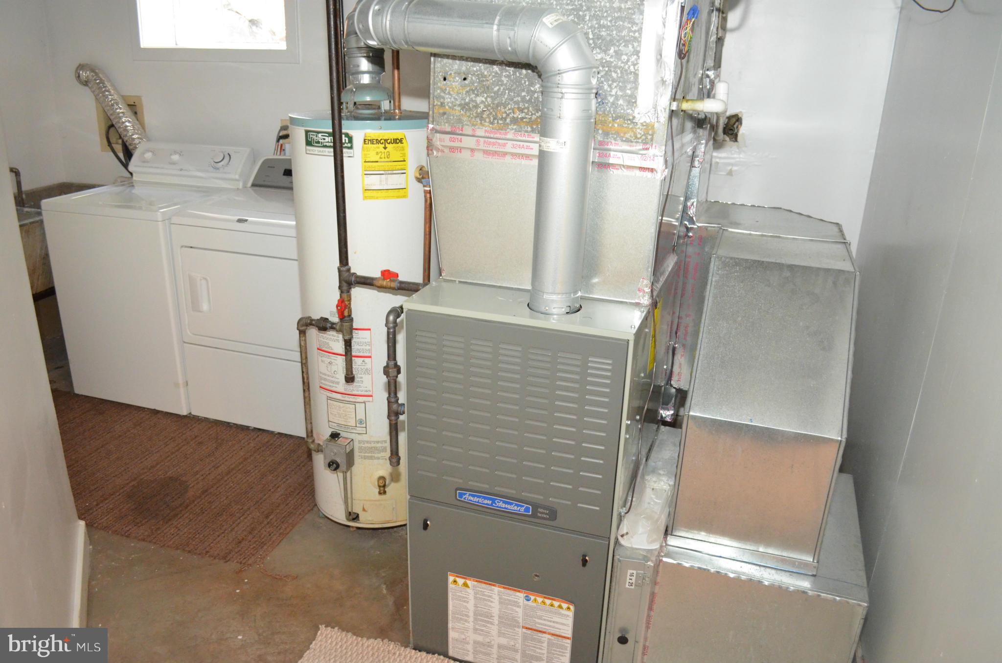 3134 38th Street Northwest Washington, DC 20016 - Photo 26 of 30 a bathroom with a granite countertop shower and a sink
