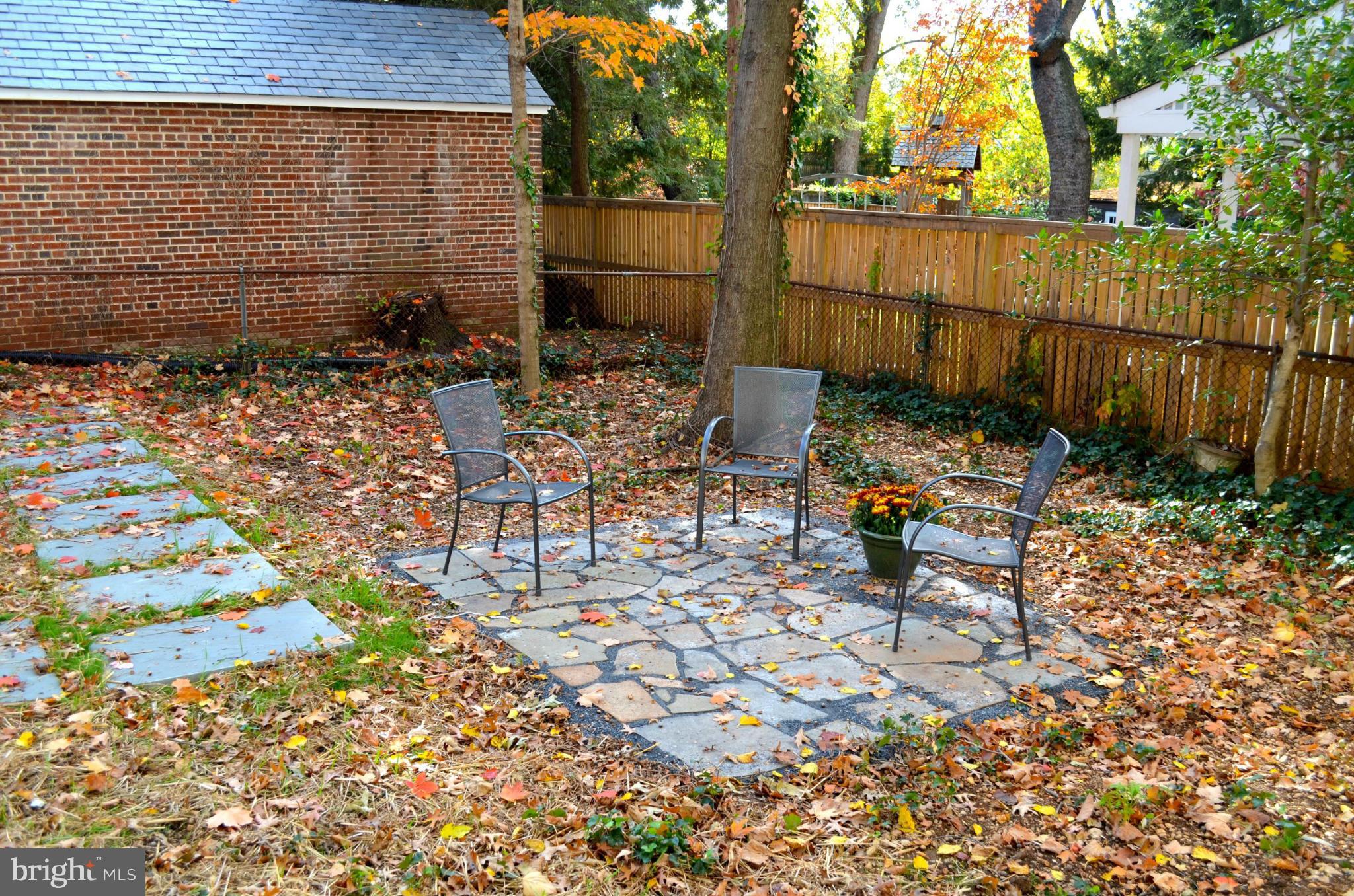 3134 38th Street Northwest Washington, DC 20016 - Photo 28 of 30 a view of a chairs and table in backyard
