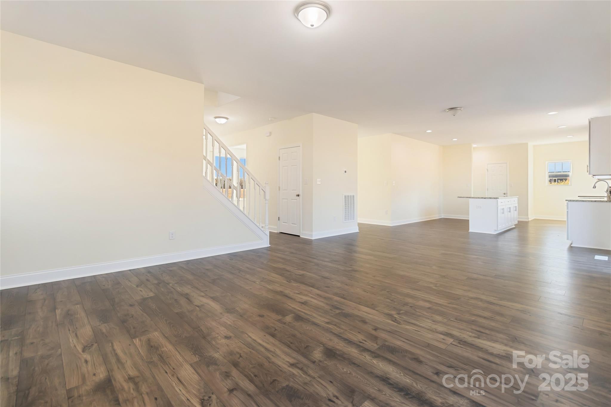 1012 Heath Helms Road Monroe, NC 28110 - Photo 12 of 48 a view of a room with wooden floor