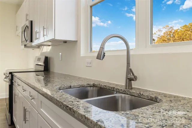 a close view of a sink and tap