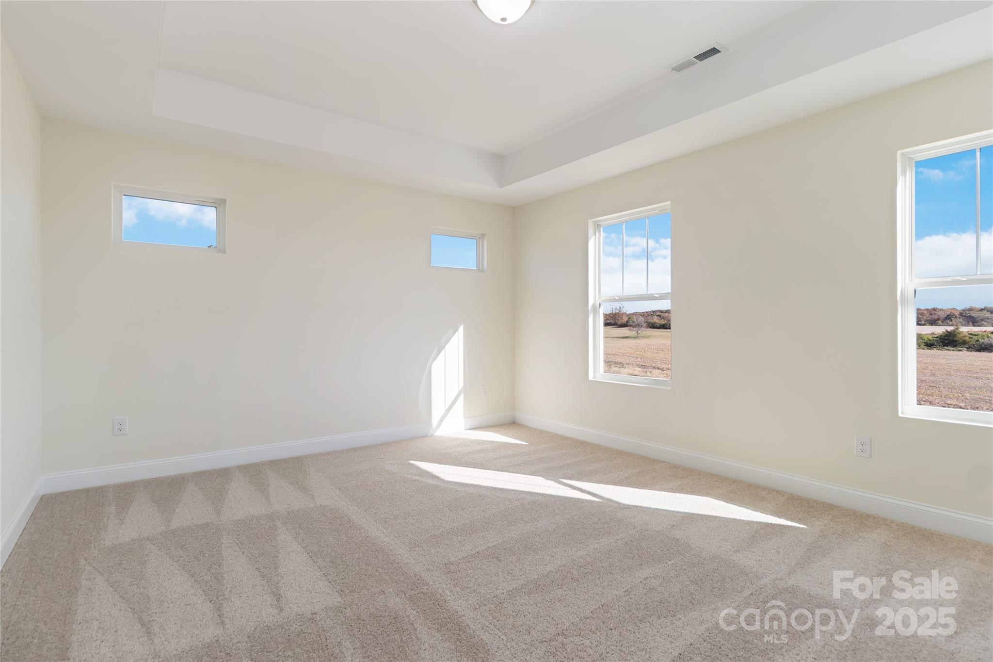 1012 Heath Helms Road Monroe, NC 28110 - Photo 30 of 48 a view of an empty room with a window