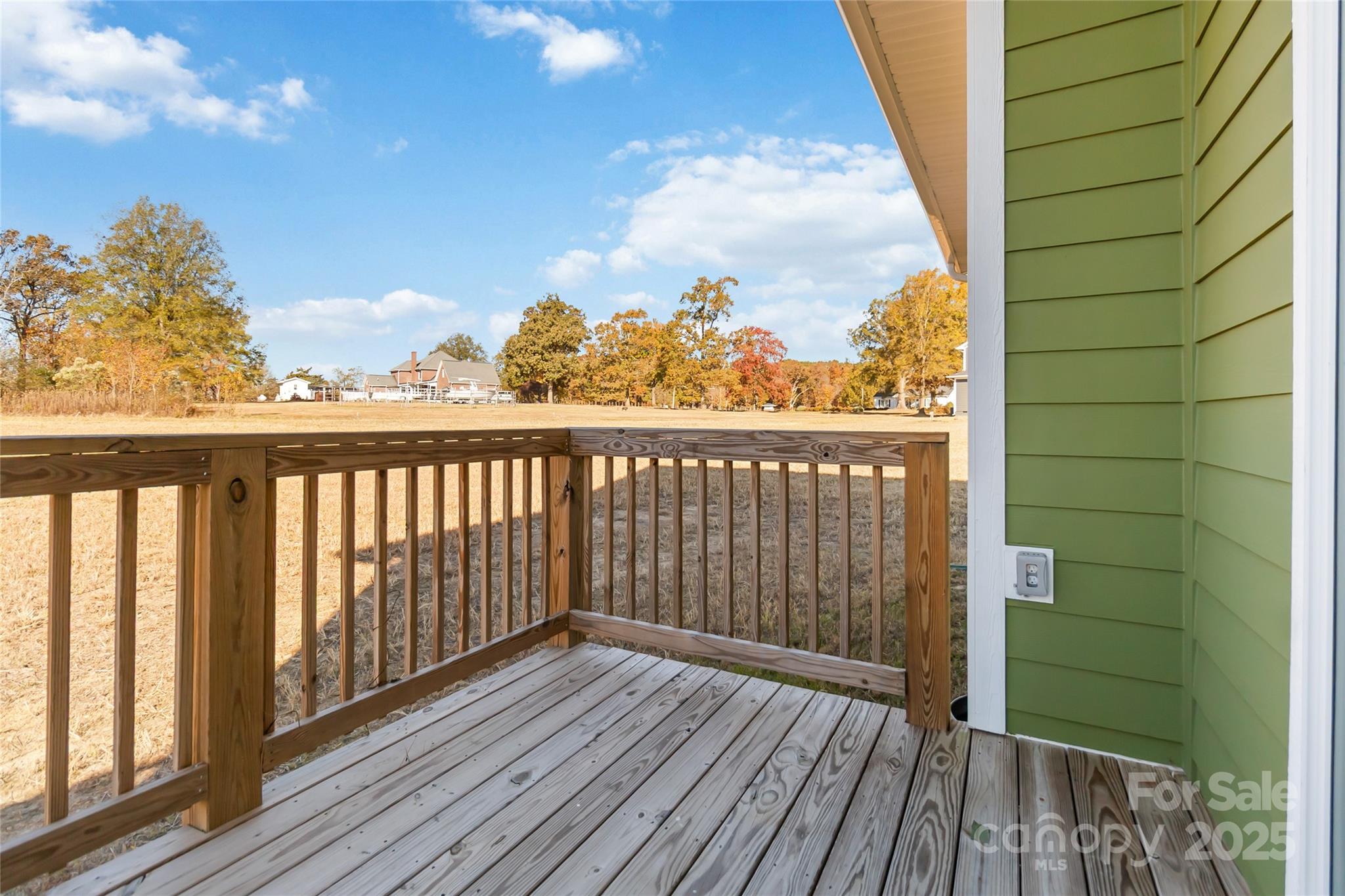 1012 Heath Helms Road Monroe, NC 28110 - Photo 41 of 48 a view of a balcony with wooden floor