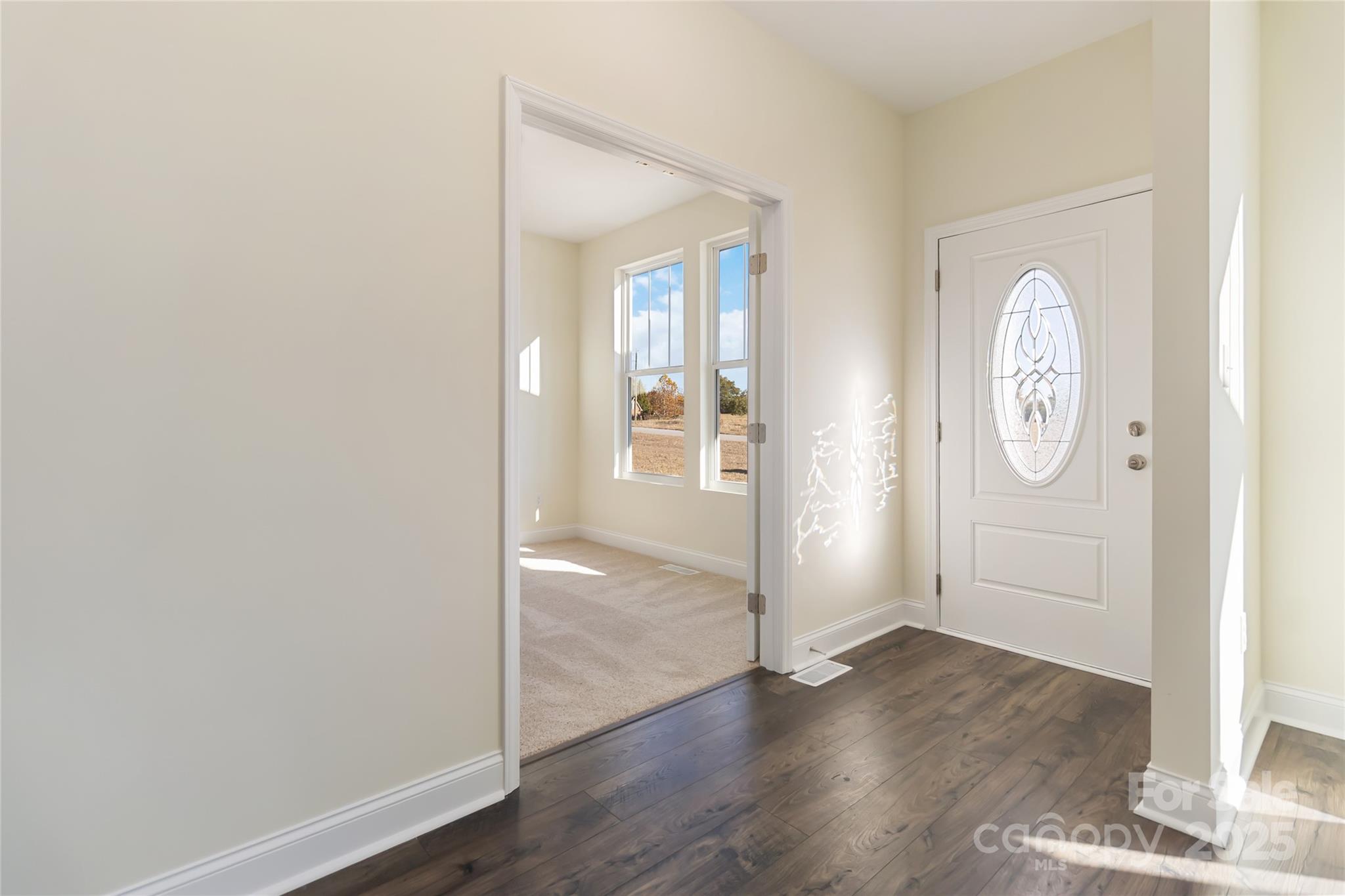 1012 Heath Helms Road Monroe, NC 28110 - Photo 5 of 48 a view of livingroom with wooden floor