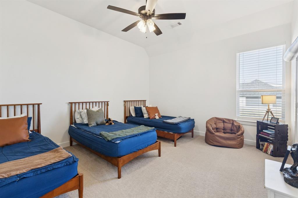 125 San Miguel Drive Decatur, TX 76234 - Photo 20 of 36 a living room with furniture and a window