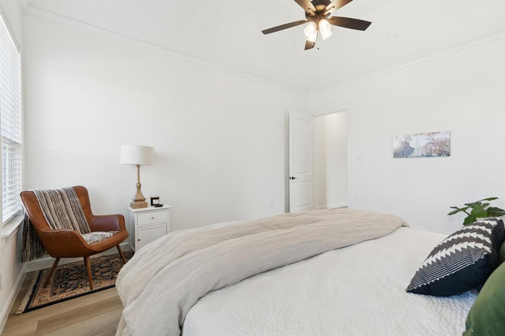 125 San Miguel Drive Decatur, TX 76234 - Photo 22 of 36 a bedroom with a bed and a chair