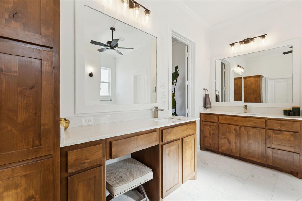 125 San Miguel Drive Decatur, TX 76234 - Photo 25 of 36 a spacious bathroom with a sink double vanity granite tub shower and a mirror