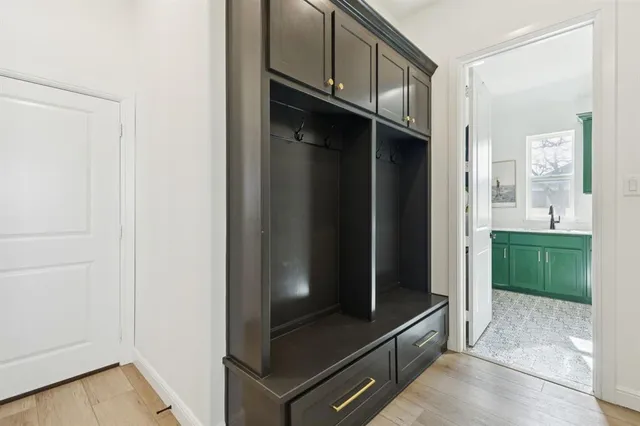 a kitchen with a sink cabinets and a sink