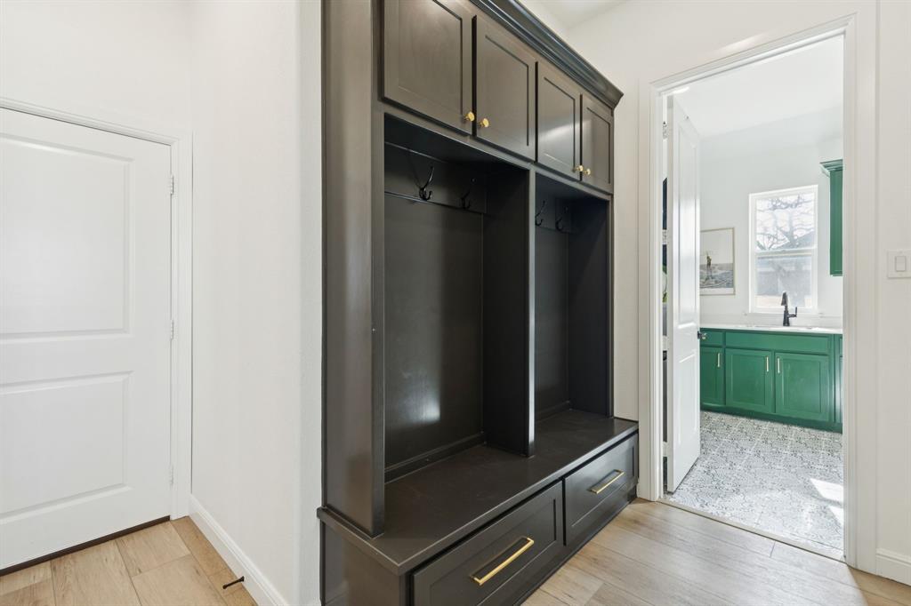 125 San Miguel Drive Decatur, TX 76234 - Photo 27 of 36 a kitchen with granite countertop a refrigerator and a sink
