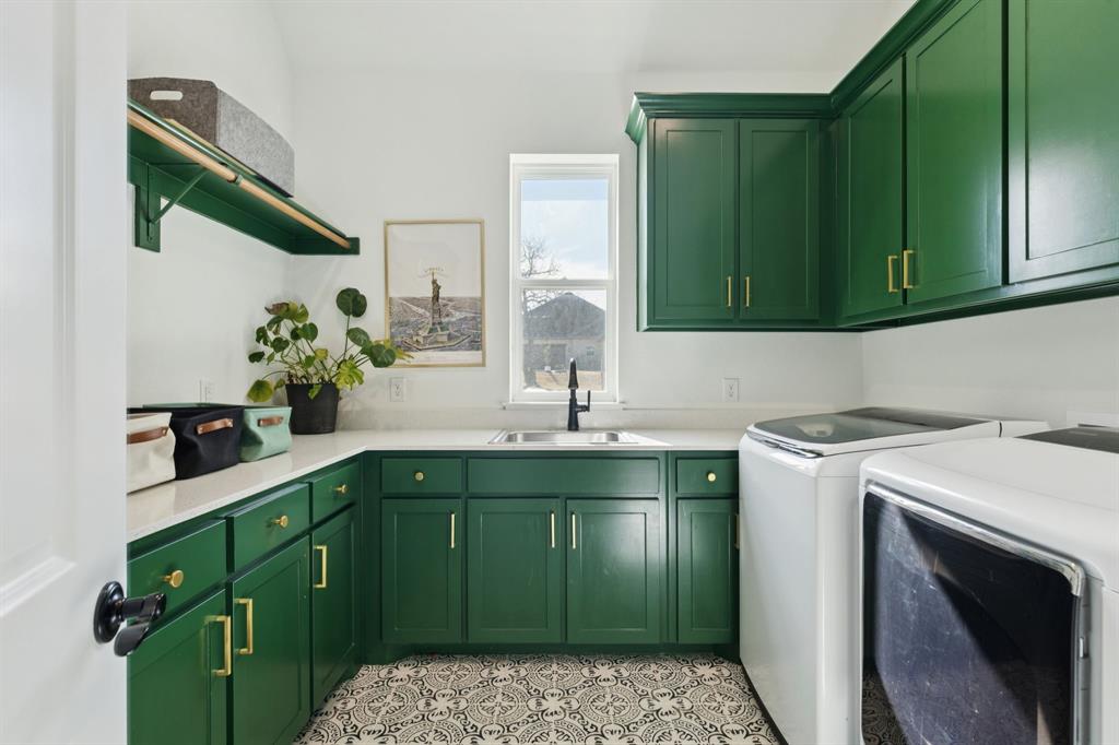 125 San Miguel Drive Decatur, TX 76234 - Photo 28 of 36 a kitchen with a sink cabinets and a sink