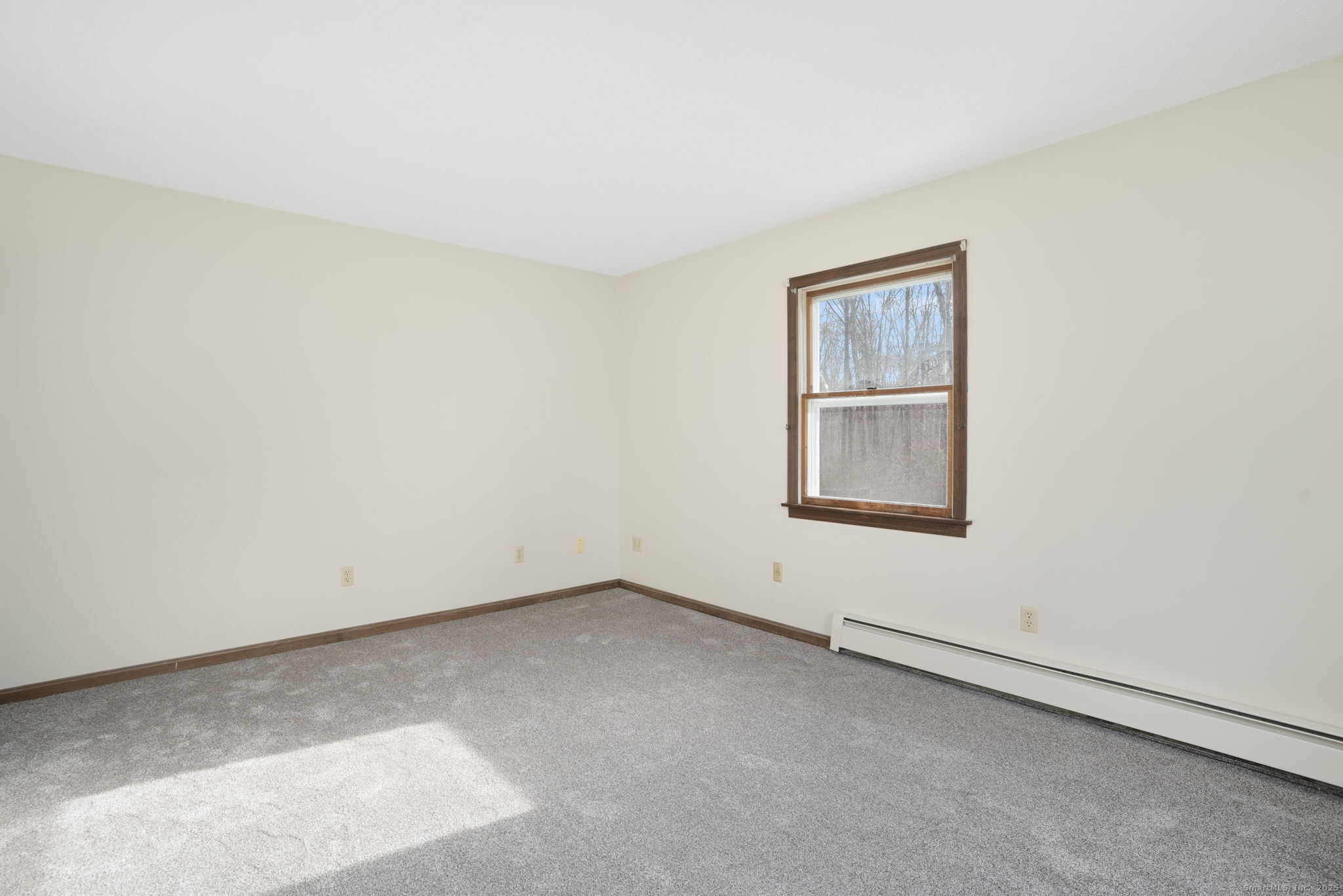 137 Drain Street Hampton, CT 06247 - Photo 16 of 30 an empty room with a window