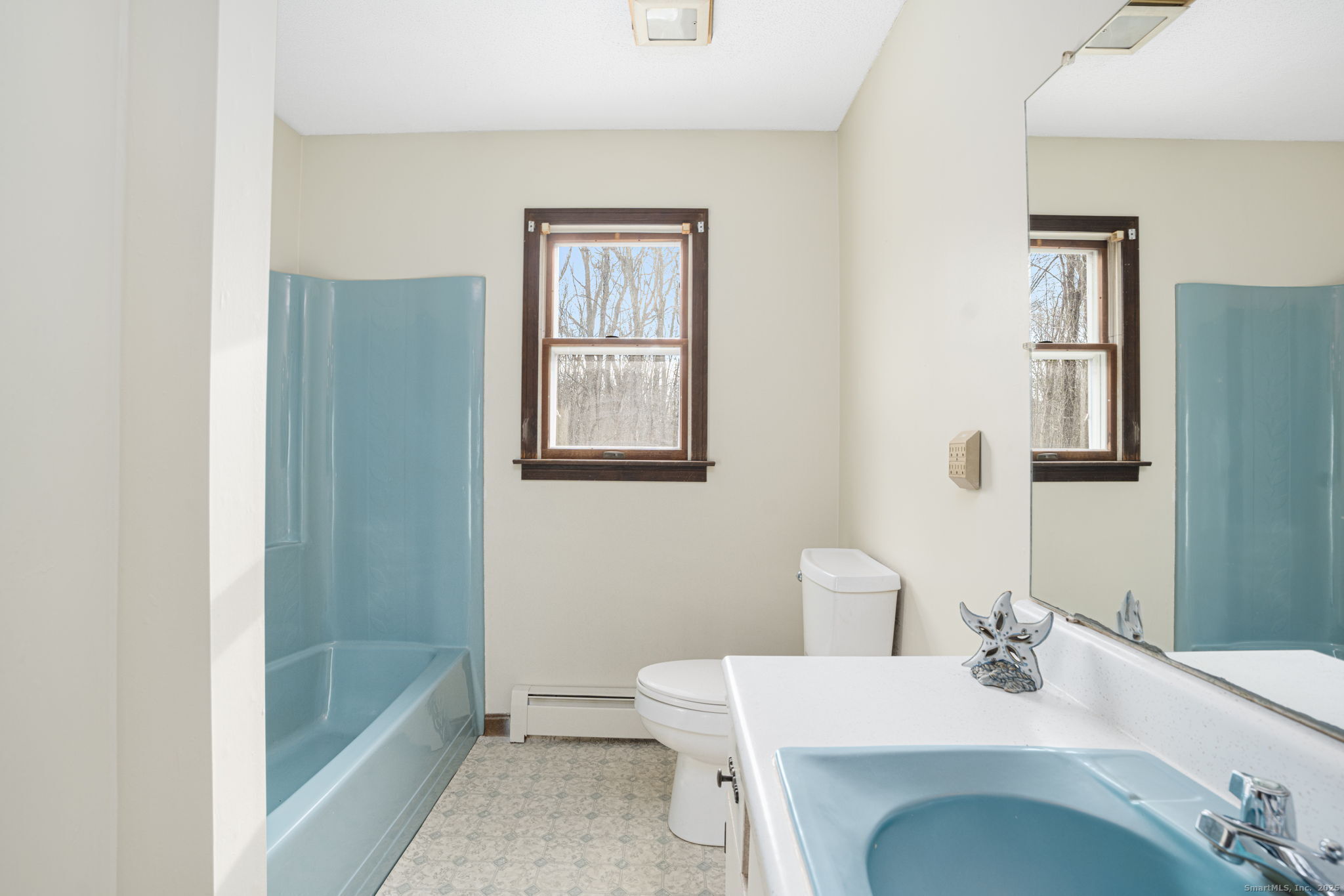 137 Drain Street Hampton, CT 06247 - Photo 17 of 30 a bathroom with a sink toilet and shower