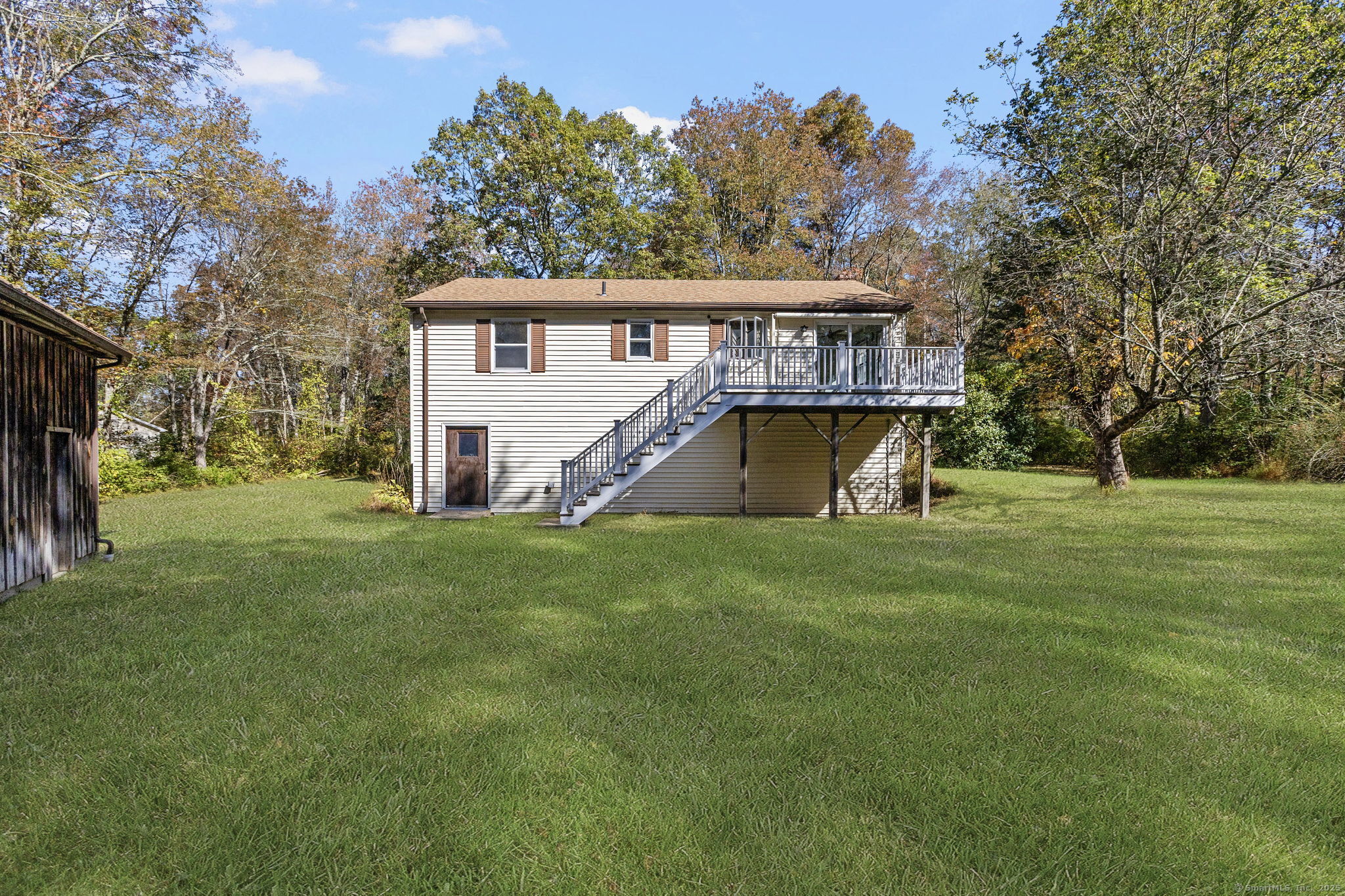 137 Drain Street Hampton, CT 06247 - Photo 27 of 30 a view of a house with a yard