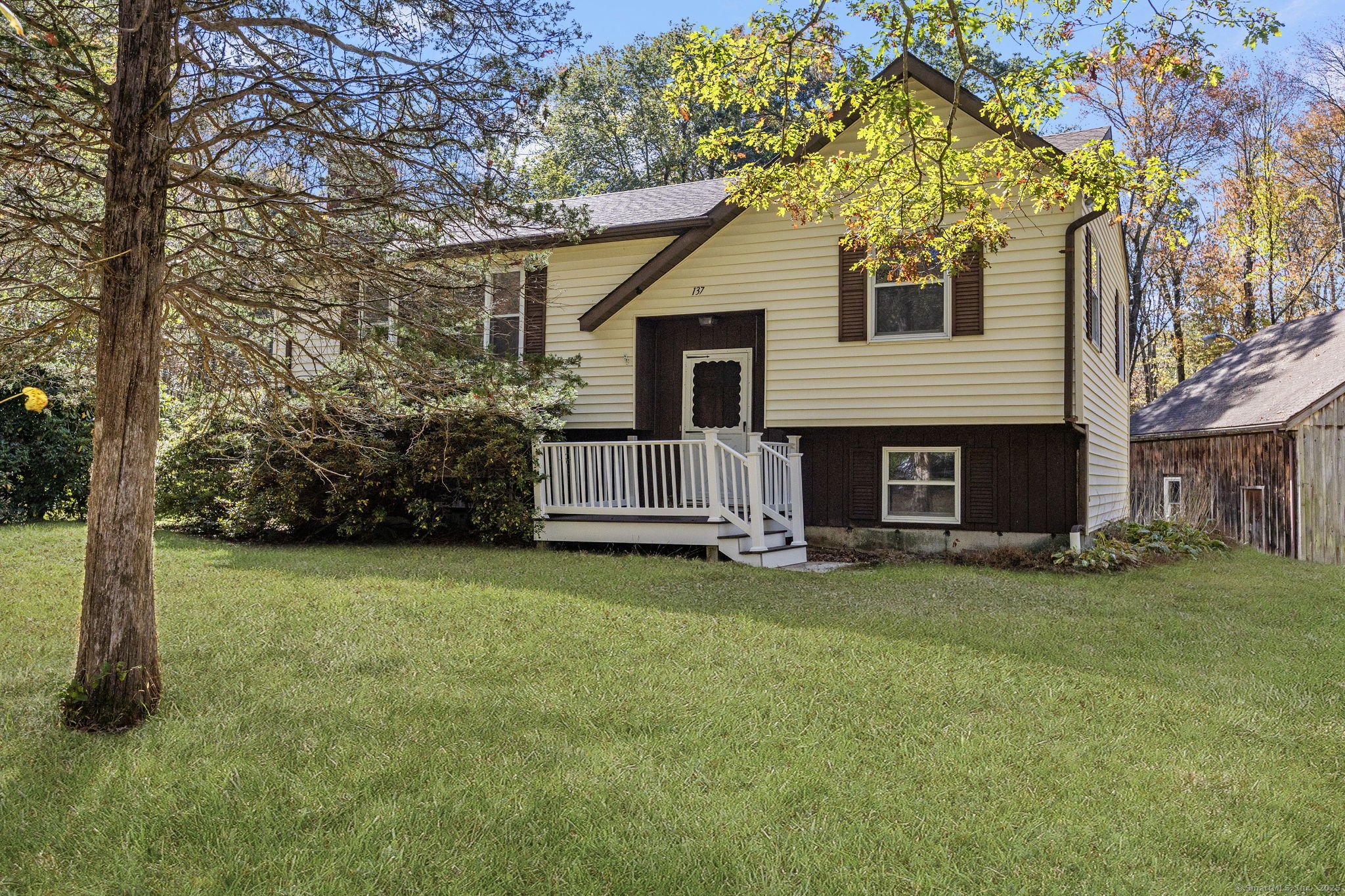 137 Drain Street Hampton, CT 06247 - Photo 30 of 30 a view of a house with a yard