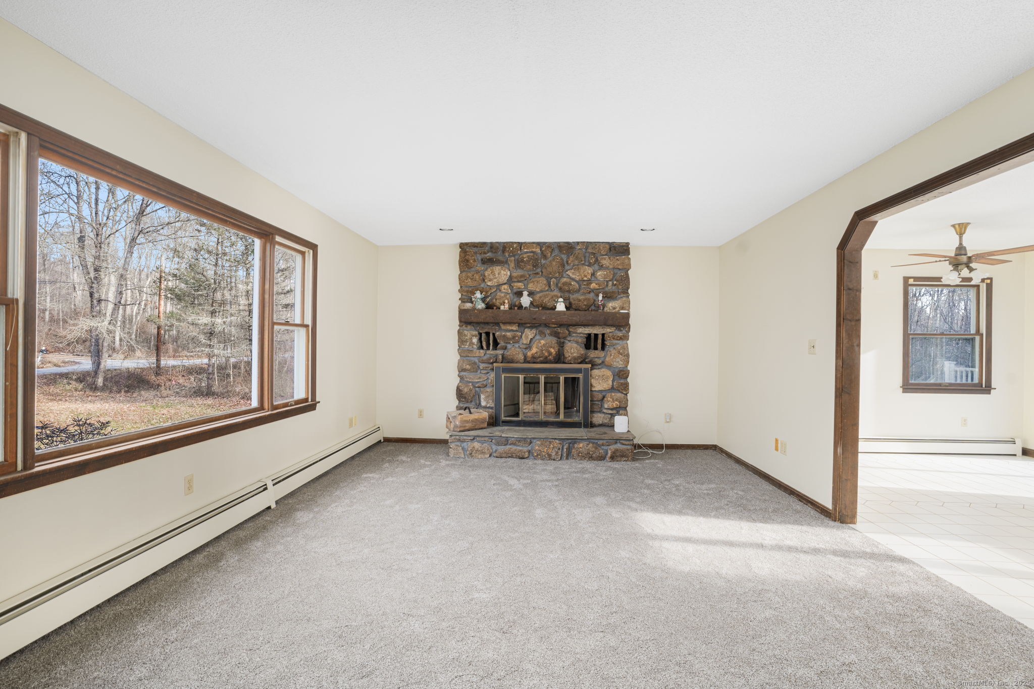 137 Drain Street Hampton, CT 06247 - Photo 4 of 30 an empty room with windows