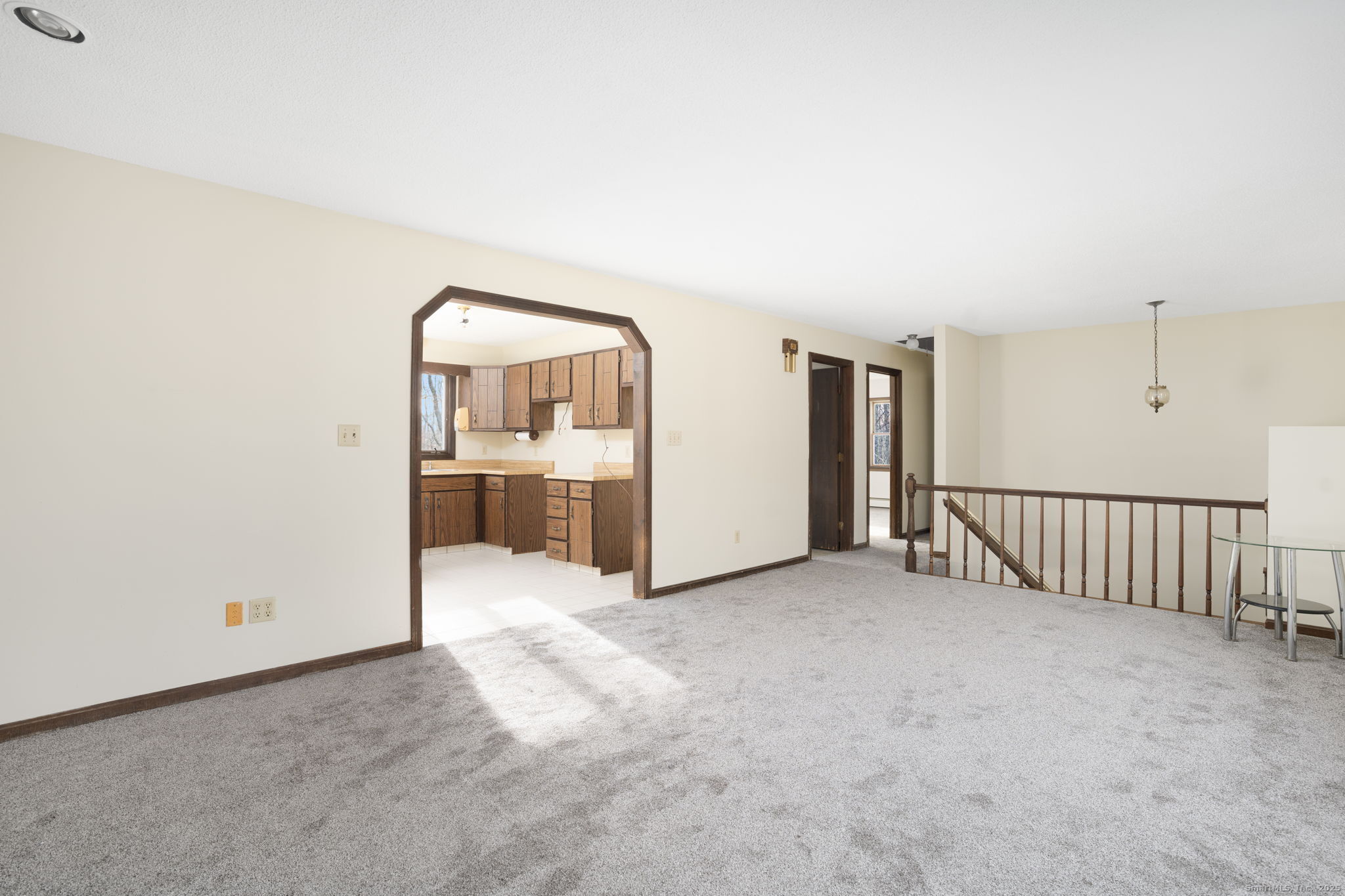 137 Drain Street Hampton, CT 06247 - Photo 7 of 30 an empty room with kitchen view and a window