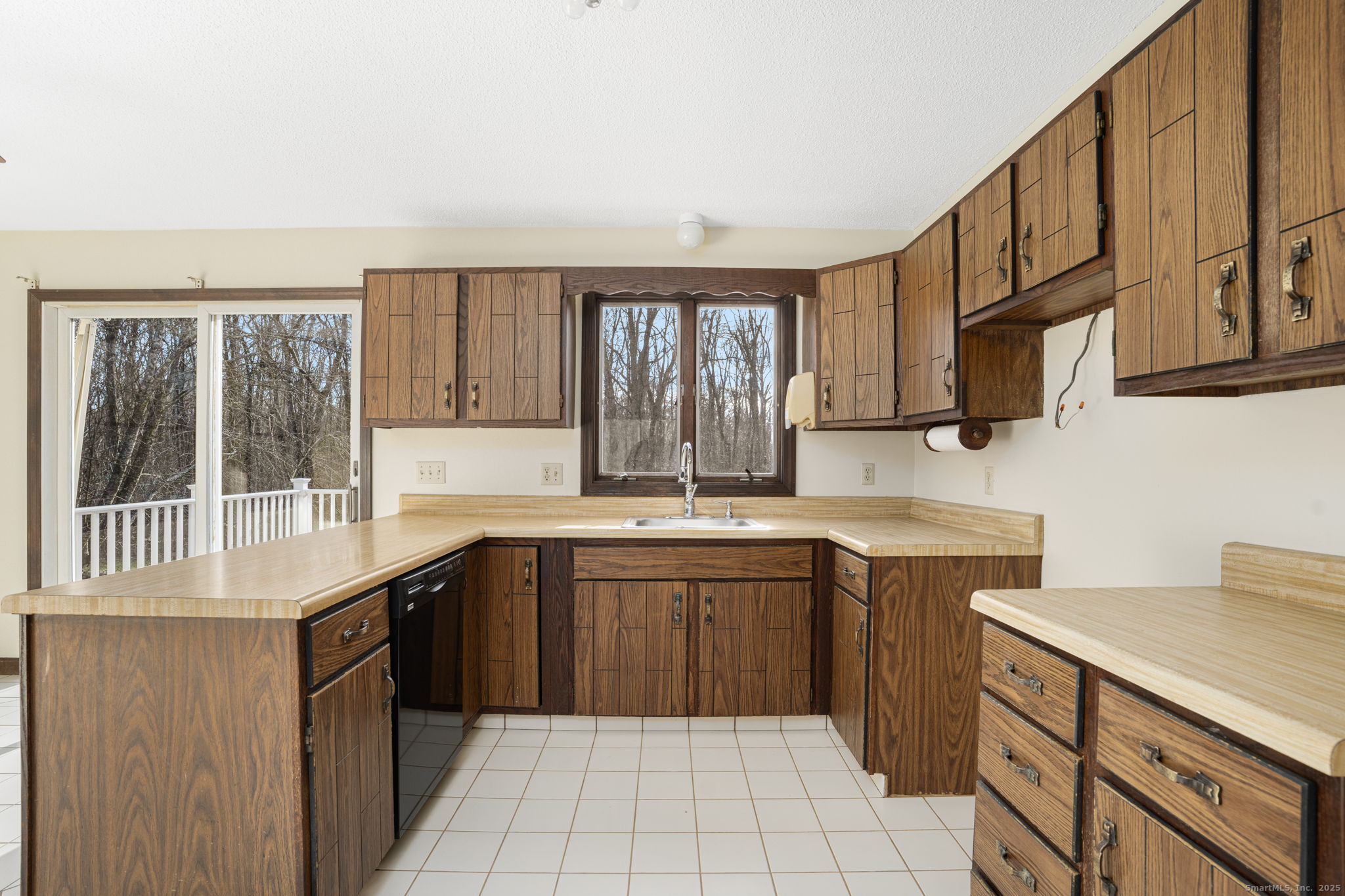 137 Drain Street Hampton, CT 06247 - Photo 9 of 30 a kitchen with a sink stove and cabinets
