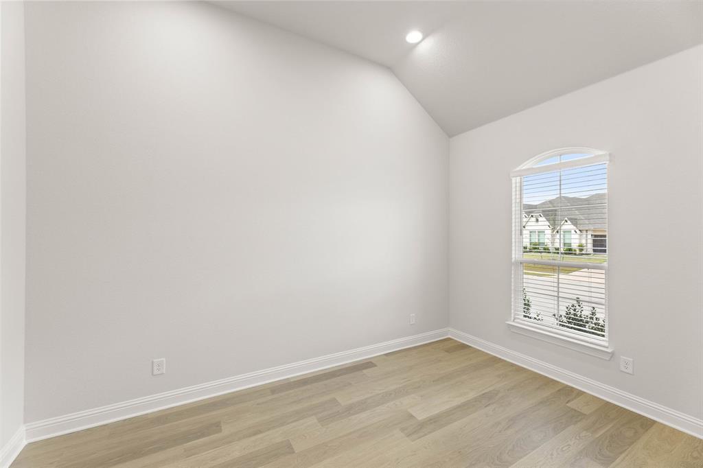 5210 Rowlan Row Midlothian, TX 76065 - Photo 12 of 40 an empty room with windows