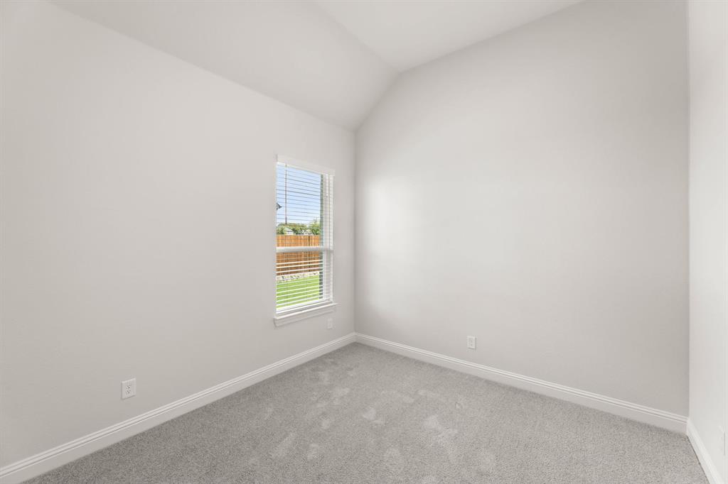 5210 Rowlan Row Midlothian, TX 76065 - Photo 17 of 40 an empty room with a window