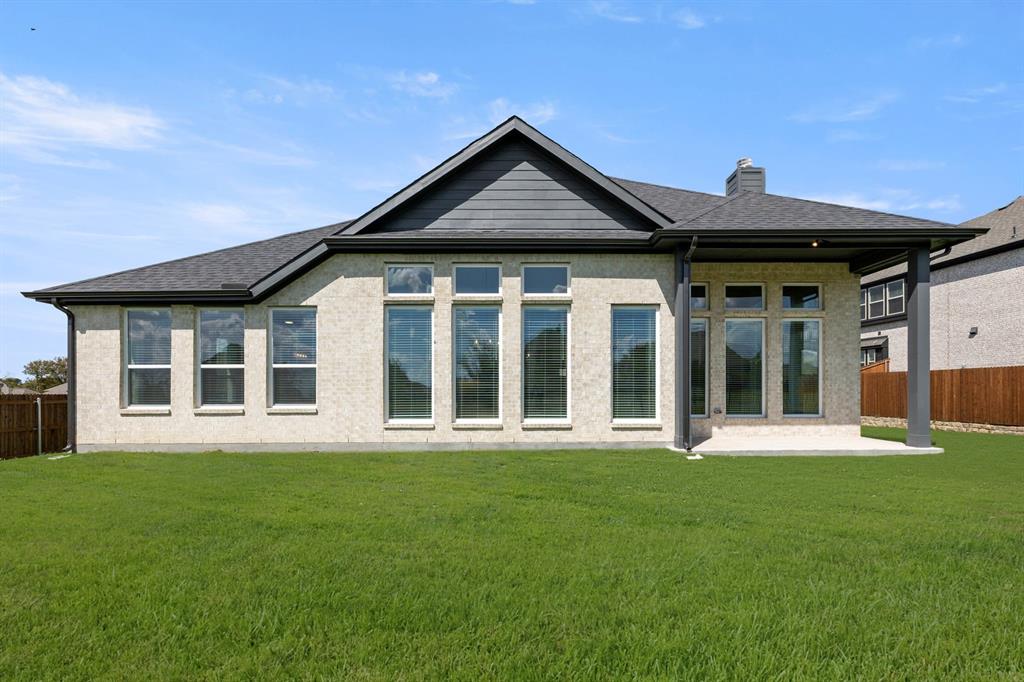 5210 Rowlan Row Midlothian, TX 76065 - Photo 4 of 40 a front view of a house with a yard