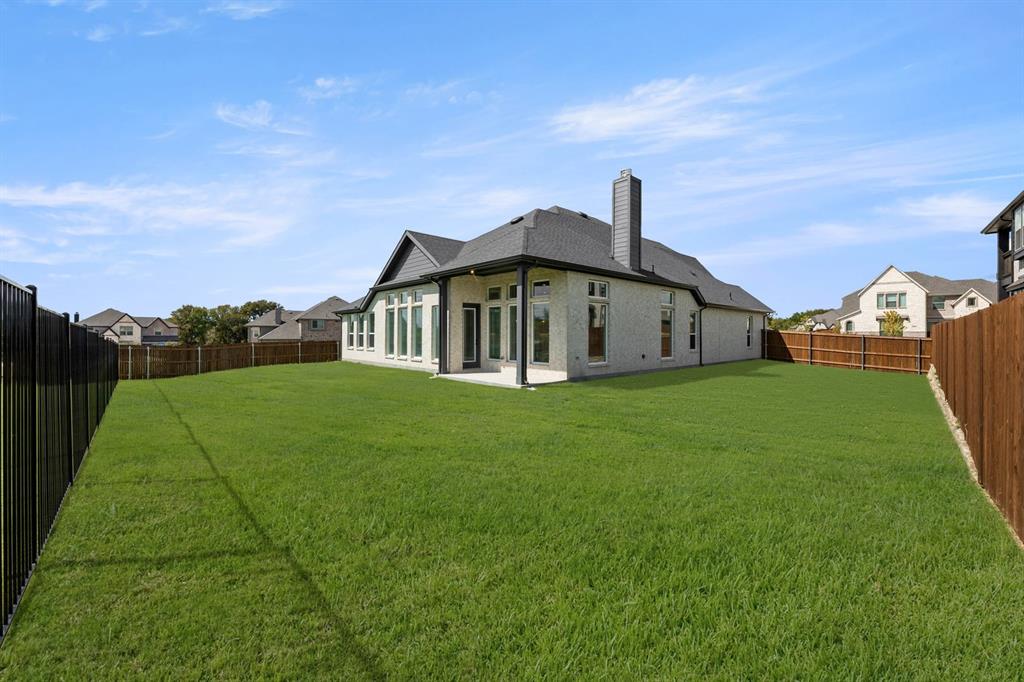 5210 Rowlan Row Midlothian, TX 76065 - Photo 7 of 40 a view of a house with a yard