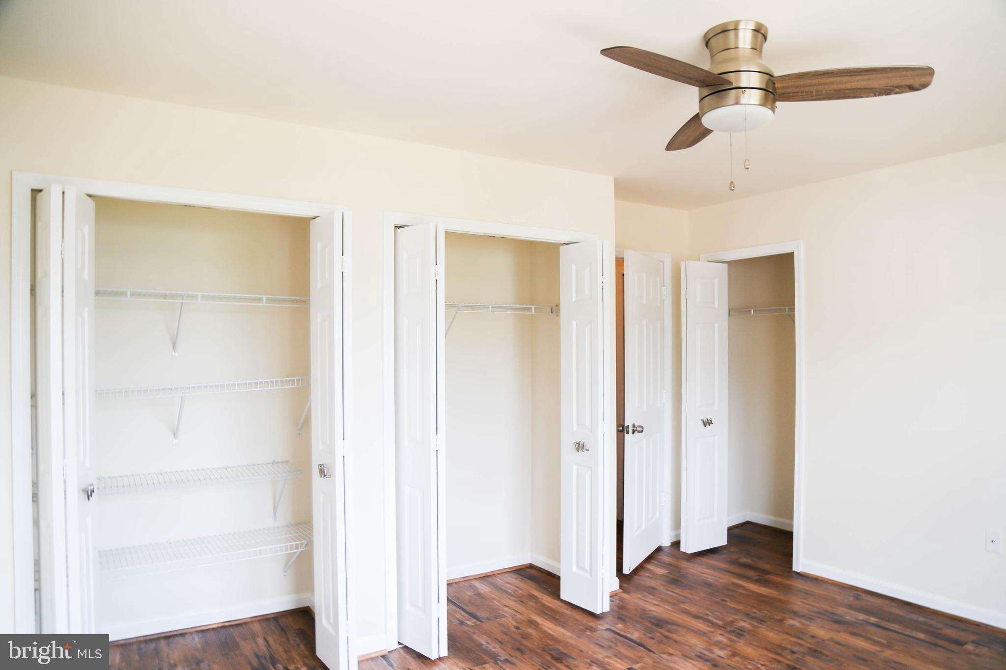 8461 Tackhouse Loop Gainesville, VA 20155 - Photo 16 of 39 a view of bedroom with wooden floor