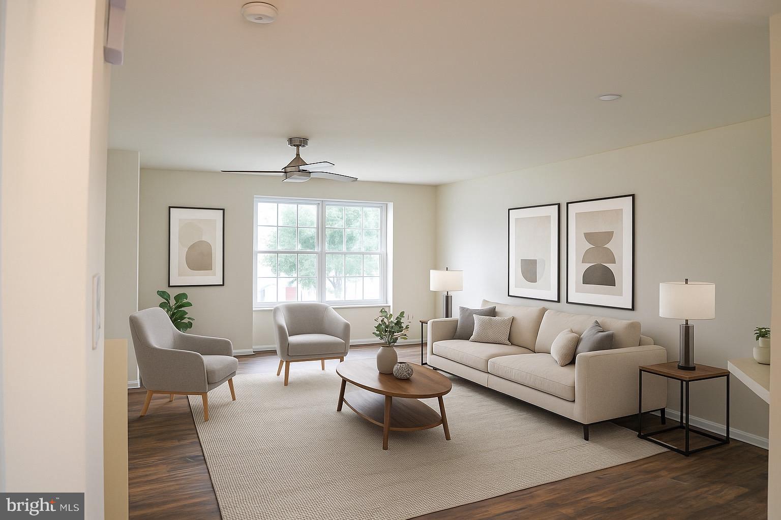 8461 Tackhouse Loop Gainesville, VA 20155 - Photo 2 of 39 a living room with furniture and a large window