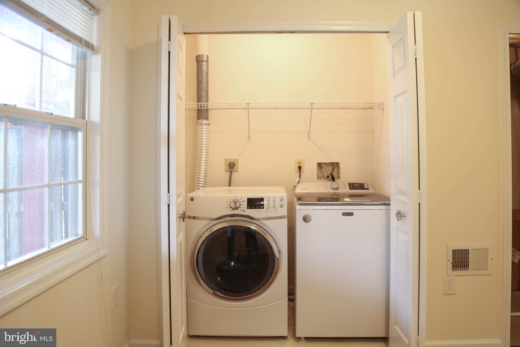 8461 Tackhouse Loop Gainesville, VA 20155 - Photo 33 of 39 a utility room with dryer and washer
